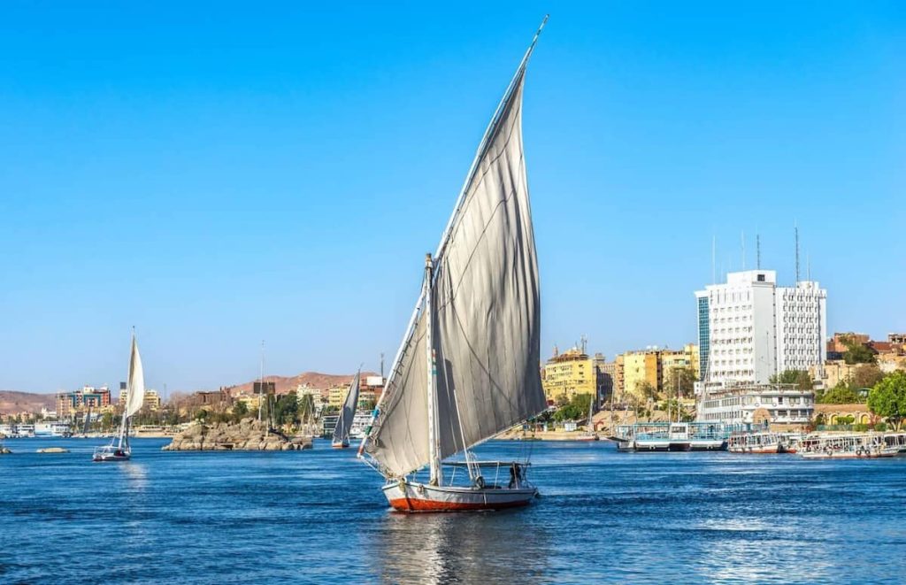 Sailing boat trip at sunny summer day in Aswan