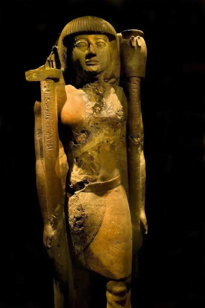 Prince Khaemwas holds two standards crowned by sacred symbols Abydos Egypt Egyptian