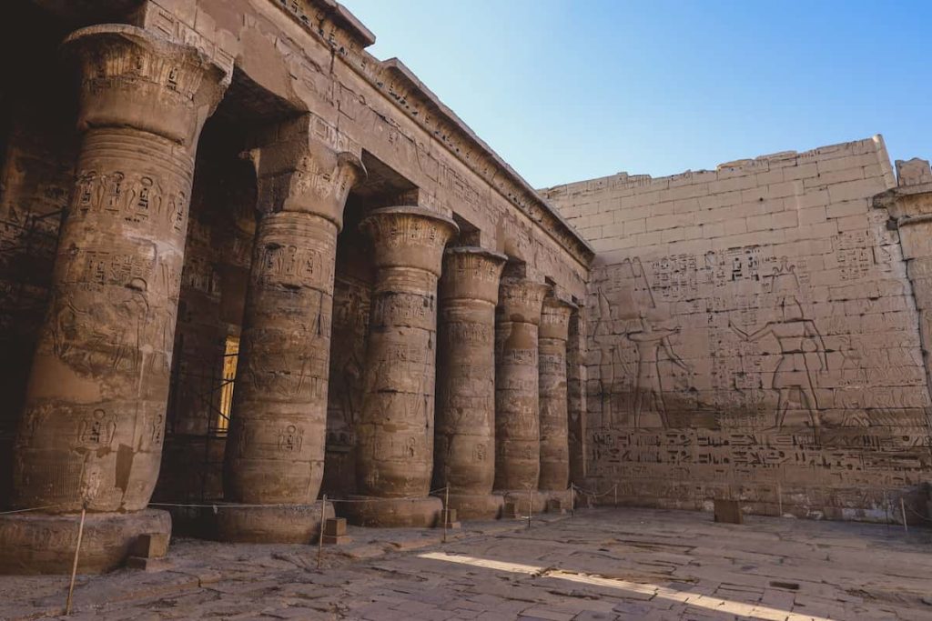 Ancient Egyptian Pillars of the Medinet Habu, Mortuary Temple of Ramesses III, near the Luxor, Egypt