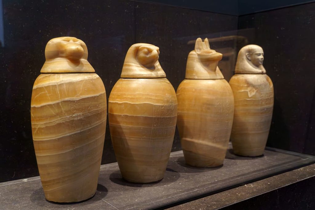 close up view of the ancient Egyptian ritual vessels of canopic jars
