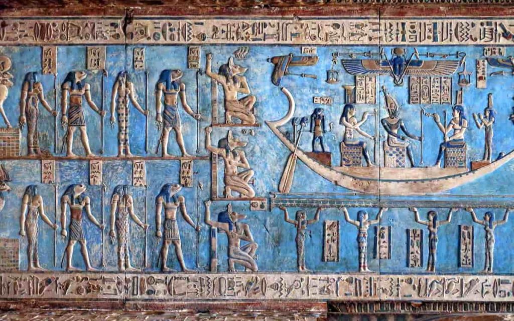 Hieroglyphic carvings and paintings on the interior walls of an ancient egyptian temple in Dendera