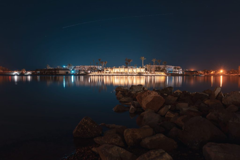 A beautiful long exposure of El Gouna lagoon with a view of a hotel at night