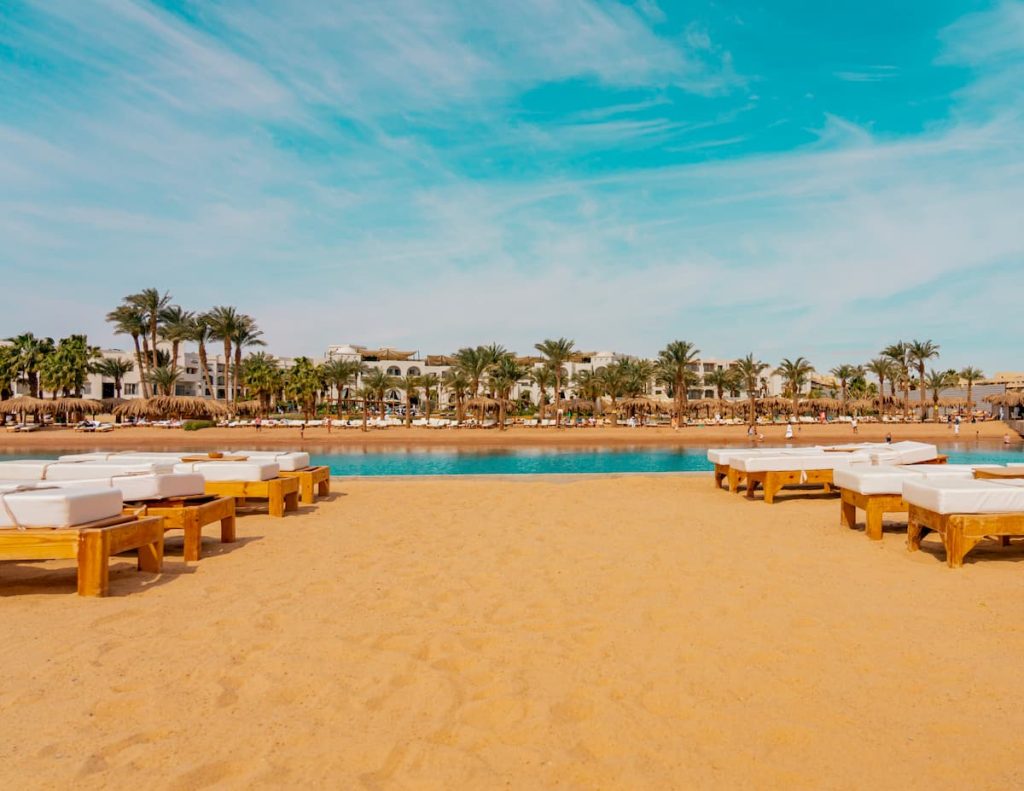 Photo from Hurghada in Egypt showing beach red sea and bed umbrella. High quality photo