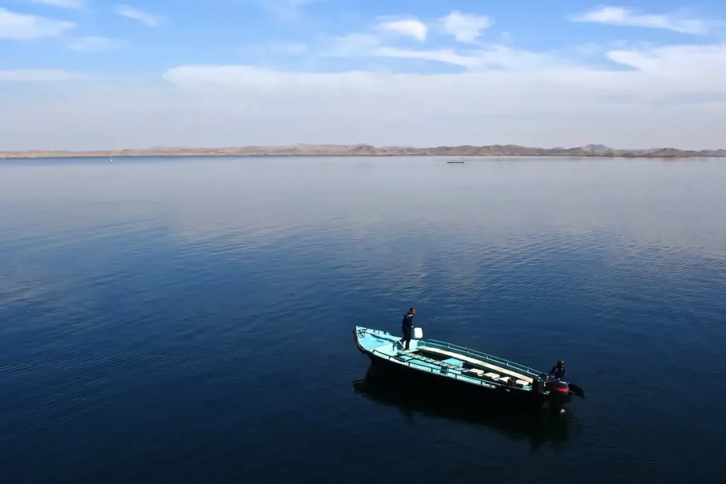 Boats on lake Nasser, The lake was created as a result of the construction of the Aswan High Dam across the waters of the Nile river. Nov 29, 2007 in Lake Nasser, Egypt