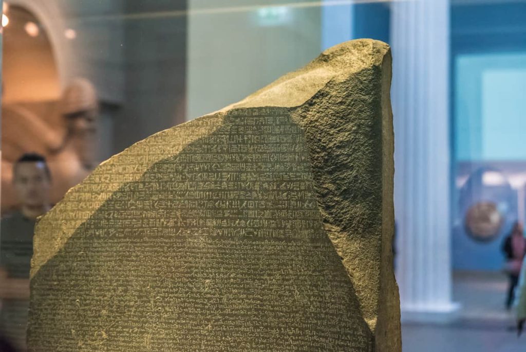 the Rosetta Stone is protected by bulletproof glass boxes in the British Museum, London, United Kingdom.