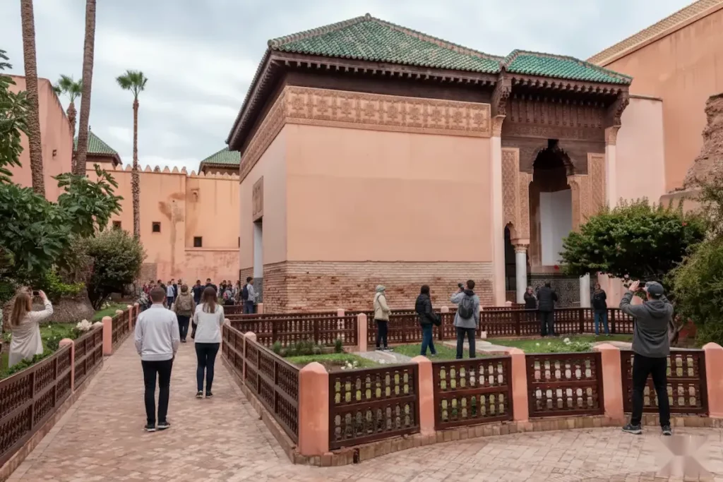 people are taking some pictures of Saadian Tombs Marrakech