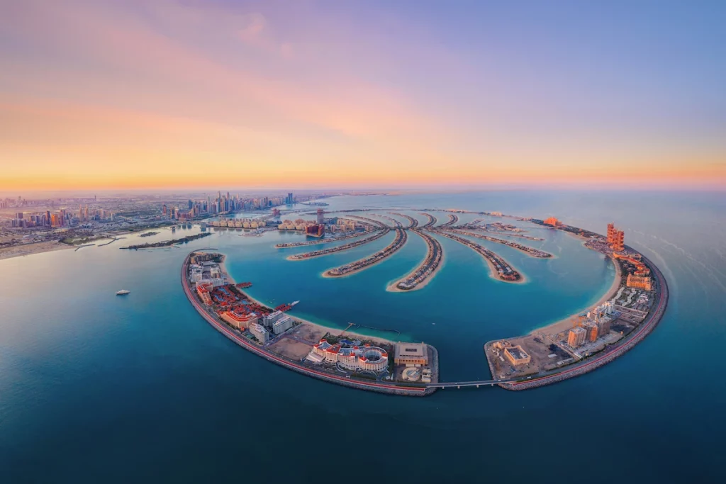 Aerial view of The Palm Jumeirah Island, Dubai Downtown skyline, United Arab Emirates or UAE.