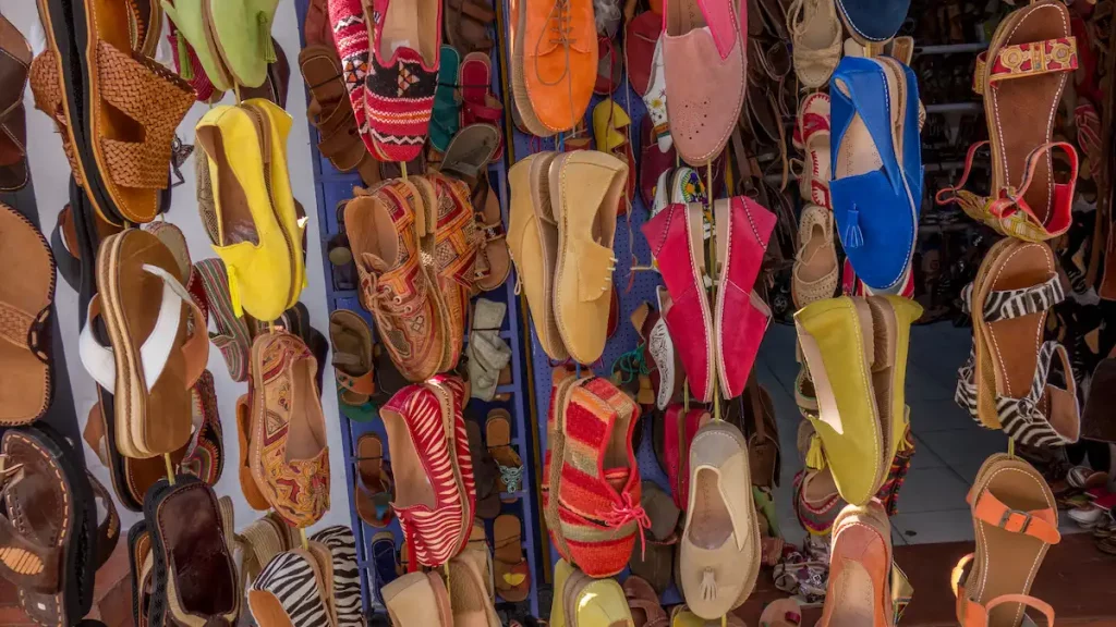 Handmade leather shoes stand in a bazaar of Morocco