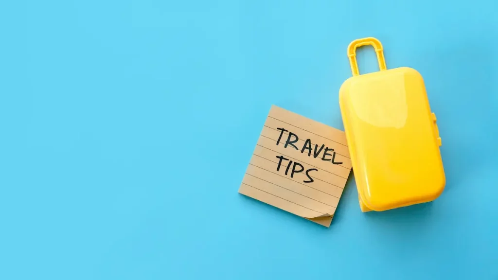 Travel Tips Note with Yellow Suitcase on Blue Background
