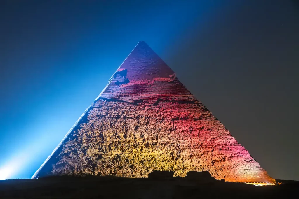 Great Pyramids of Giza, Egypt, illuminated light at night