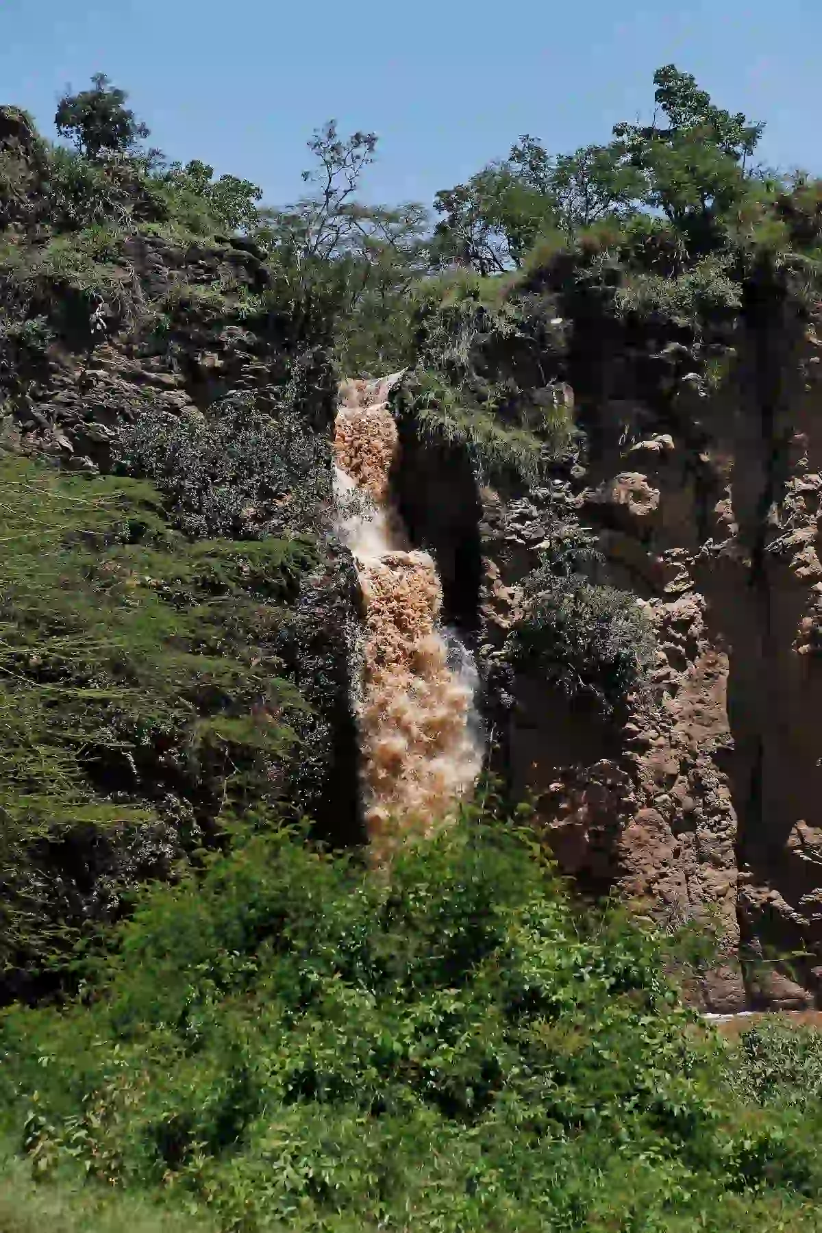 View of Waterfall, River draining into lake, Makalia Waterfall, Lake Nakuru Great Rift Valley, Kenya 