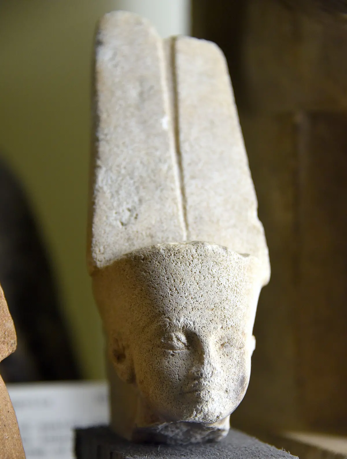 Head of the god Min-Amun wearing the double plume