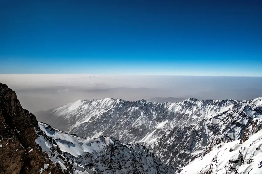 Amazing view of the Atlas Mountains in Morocco as seen from the peak of Mt. Toubkal, the tallest peak in North Africa