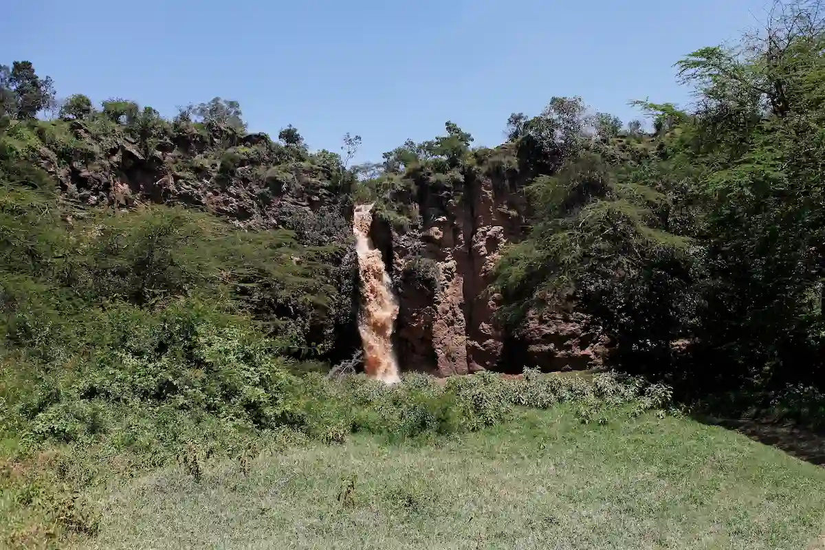 View of Waterfall, River draining into lake, Makalia Waterfall, Lake Nakuru Great Rift Valley, Kenya 