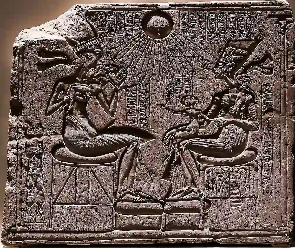 Relief depicting Akhenaton and Nefertiti with three of their daughters under the rays of Aton 