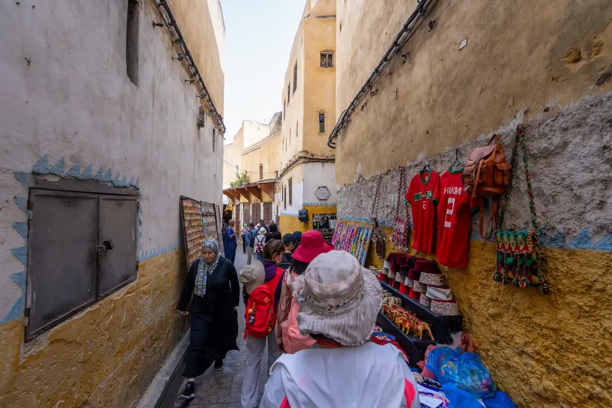 Old City of Fes, Morocco - March 23, 2024: A vibrant scene from a traditional market, showcasing a variety of goods for sale.
