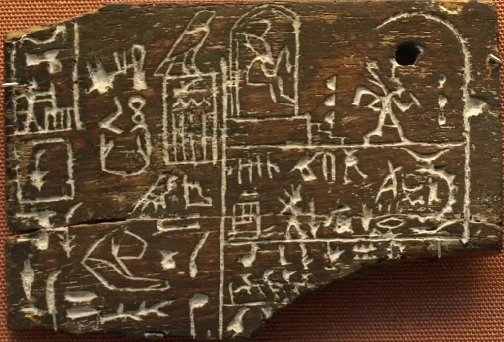 Ebony label depicting the pharaoh Den, found in his tomb in Abydos, circa 3000 BC.