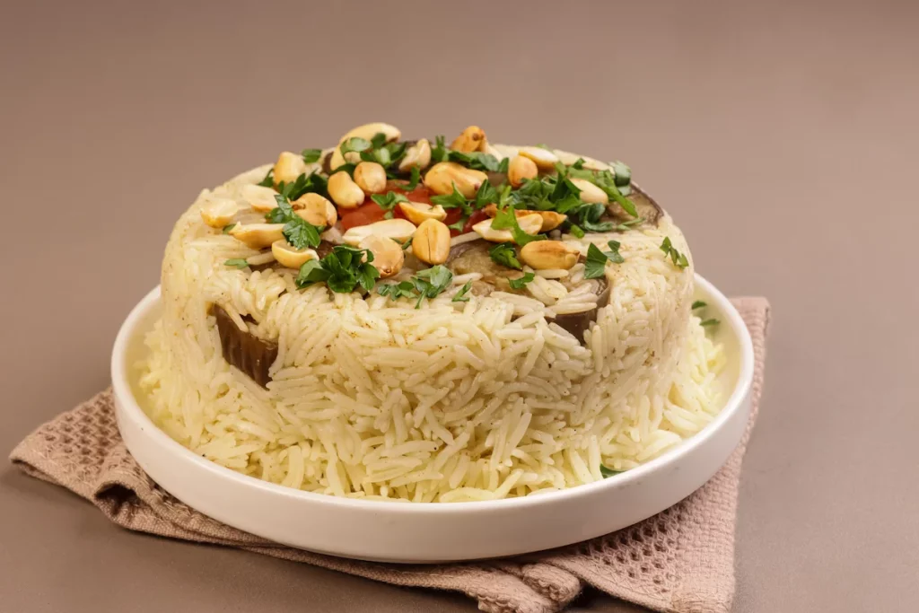 Maqluba or Maqloubeh is Traditional Palestina Rice. Levantine dish that is popular across the Levant including in Palestine, Jordan, Syria, Lebanon, and Iraq. 
