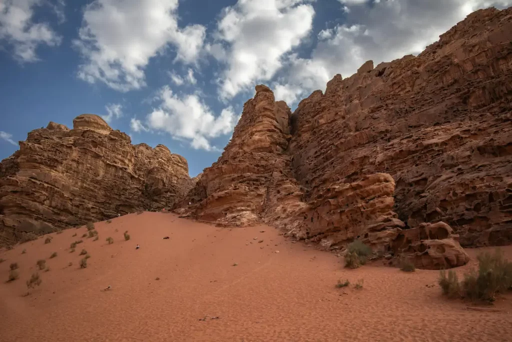 Scene of Rock Formation in Wadi Rum. Rocky Cliff in Middle East Desert. Beautiful Canyon with Sand in Jordan.