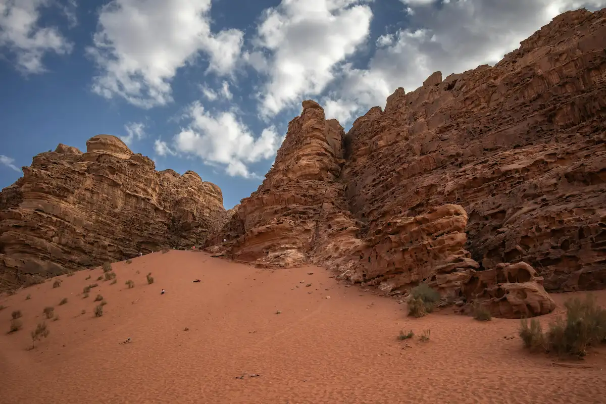 Scene of Rock Formation in Wadi Rum. Rocky Cliff in Middle East Desert. Beautiful Canyon with Sand in Jordan.