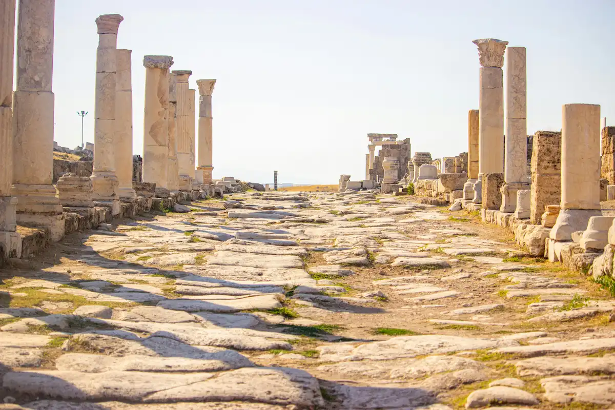 Ancient Roman Road with Stone Columns in Ruins 